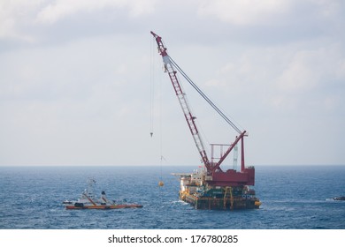 Crane Barge Doing Marine Heavy Lift Installation Works In The Gulf Or The Sea