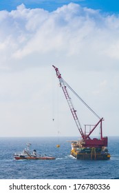 Crane Barge Doing Marine Heavy Lift Installation Works In The Gulf Or The Sea