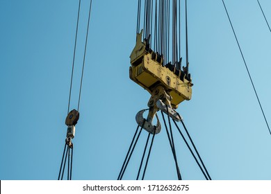Crane block, with safe working load (SWL) of 3000 Short Ton (ST)  and auxiliary block of 30Ton of a derrick pipelay barge during lifting operations