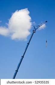 crane in blue sky with cloud