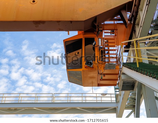 The crane cabin or the operating room\
of the crane that is used to lift heavy steel\
coils.