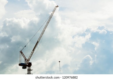 crane with cloudy sky