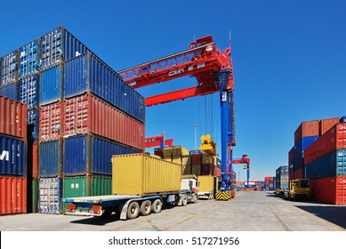   crane and container - Shutterstock ID 517271956