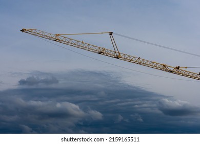 Crane Girder Over Dark Clouds