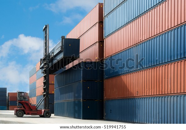 Crane lift up\
container box loading to container depot use for cargo import,\
export, logistics\
background.