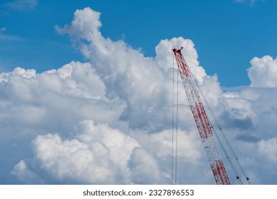 crane lifting in the cloud