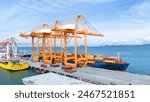 Crane loading box container to cargo ship at commercial dock port. Shipyard Cargo Container Sea Port Freight forwarding service logistics and transportation. International Shipping  Customs Port.	
