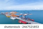 Crane loading box container to cargo ship at commercial dock port. Shipyard Cargo Container Sea Port Freight forwarding service logistics and transportation. International Shipping  Customs Port.	

