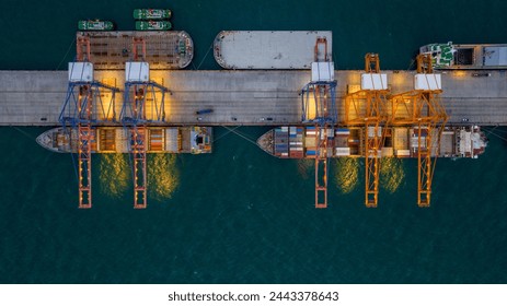 Crane loading box container to cargo ship at commercial dock port. Shipyard Cargo Container Sea Port Freight forwarding service logistics and transportation. International Shipping Depot Customs Port