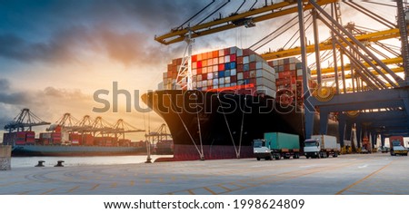 crane loading cargo container import container ship in the international terminal logistic sea port concept freight shipping by ship, Truck running in port under the Big Crane transport trade 
