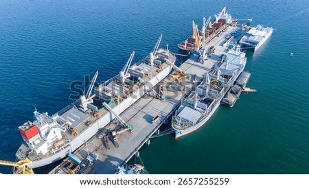 crane loading cargo container import container ship in the international terminal logistic sea port concept freight shipping by ship, Truck running in port under the Big Crane transport trade	