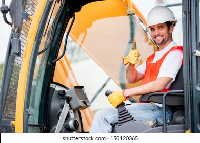 Crane Operator At A Construction Site Looking Happy 