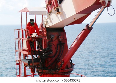 Crane Operator Work On Oil And Rig Platform For Support Heavy Cargo