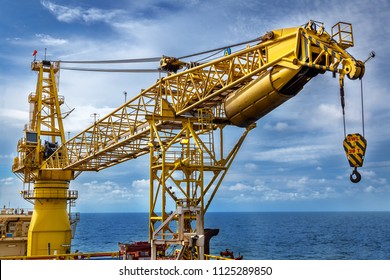 Crane, Pedestal crane winch, Steel wire rope on production platform, Energy and petroleum industry - Shutterstock ID 1125289850