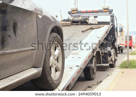Crane ready to tow elegant trolley