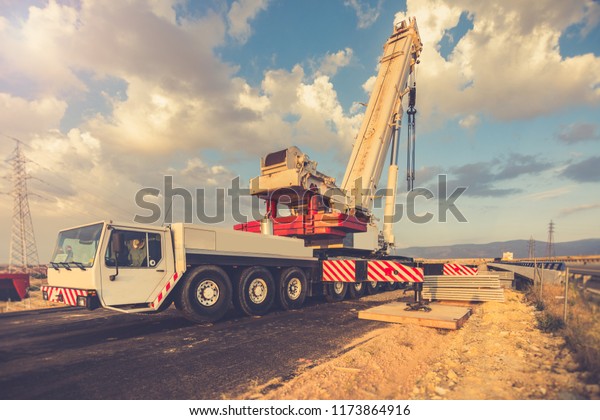 Crane
truck in the construction of a bridge on a
highway
