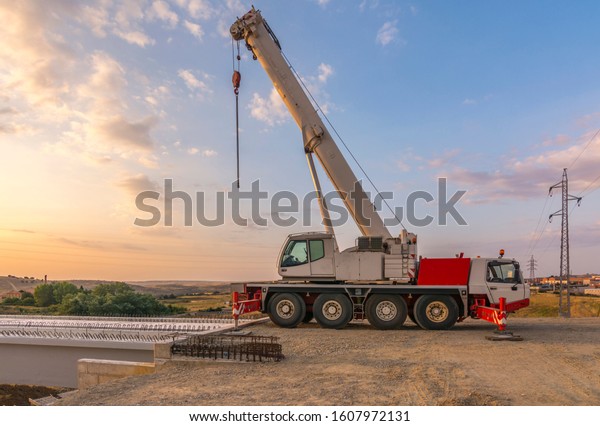 Crane trucks in
the construction of a
bridge