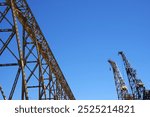 Cranes and huge metal structures at an old defunct shipyard