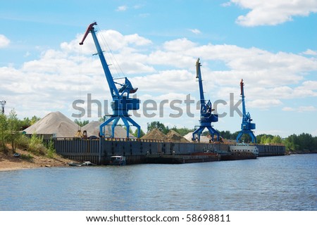 cranes and sand hills on river port