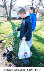 Cranford, NJ, USA April 1 Two Children Pick Up Litter While Participating In A Community Clean Up In Cranford, New Jersey 