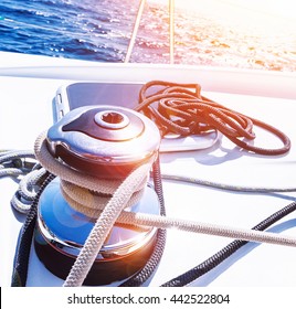 Crank Handle Of Sailboat, Detail Of Yacht, Holder For Rope, Bright Sunset In The Sea, Summer Holidays, Luxury Water Transport, Yachting Sport Concept 