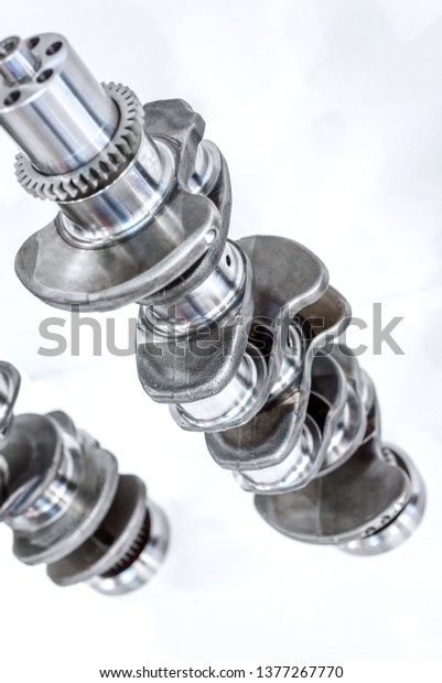Crankshaft of an internal combustion engine. Main\
part of the automobile\
engine.