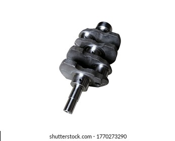Crankshaft of a two-cylinder tractor engine on an isolated white background. Spare parts.