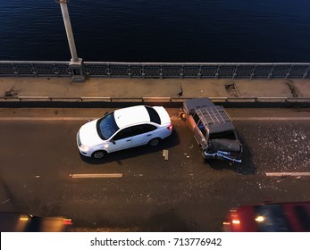 Crash or auto accident on the bridge, collision of two cars, top view