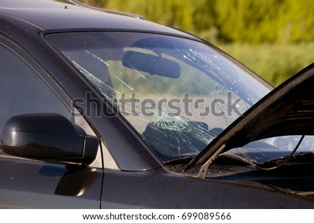 Crash car window on the accident site