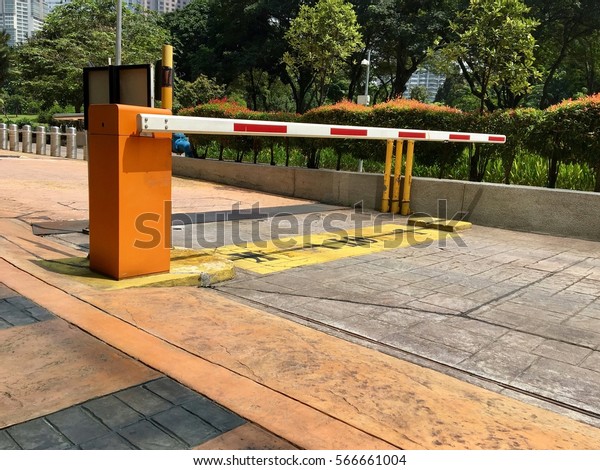 Crash gate\
barrier to an office\'s parking\
space