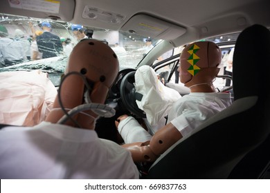 Crash Test Dummies in a car after a Crash Test. - Shutterstock ID 669837763