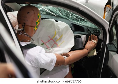 Crash Test Dummies in a car after a Crash Test. - Shutterstock ID 669837766