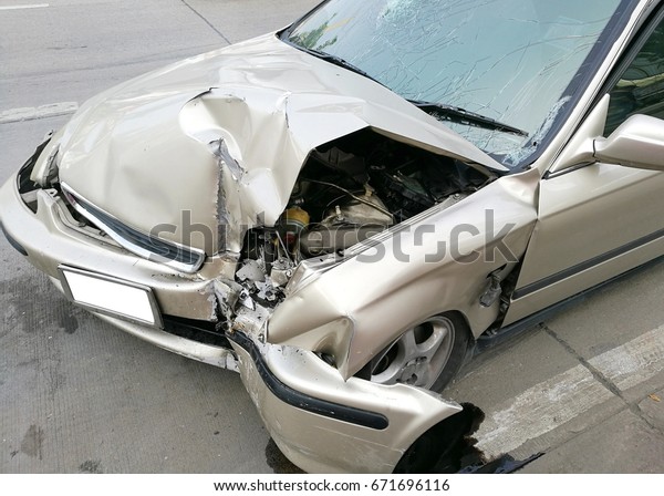 Crashed car with another\
car with damaged front., Accident of transportation on the\
street.