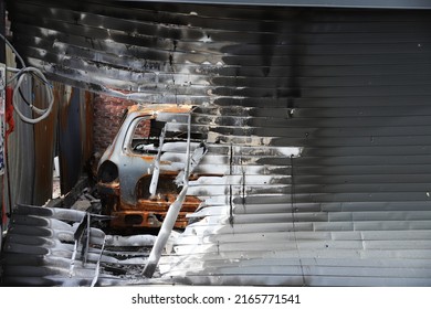 Crashed Car, Broken Garage Door