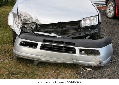 Crashed car front. Effects of drunk driving - traffic accident. Smashed vehicle.
