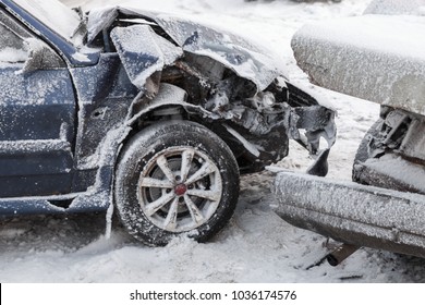 Crashed Cars In Accident On Winter Road With Snow