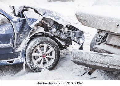 Crashed Cars Right After An Accident On Winter Road With Snow