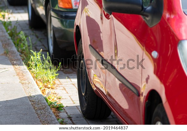 Crashed and dented car door is totally demolished\
after a heavy car accident with a write-off for the car insurance\
or repair needs with hit-and-run after collision for car insurance\
in traffic injury