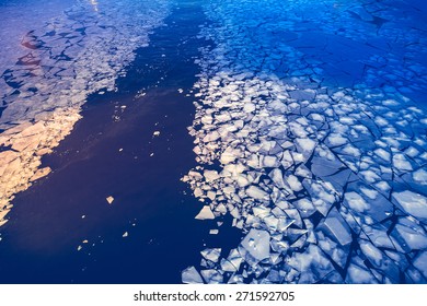 Crashed ice on the river surface. Abstract background