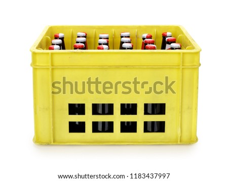 Crate with beer bottles isolated on white, contains clipping path