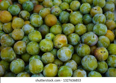 Crate Of Green Gage Plums (reine Claude) At A Farmers Market