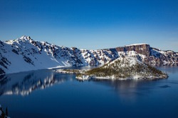 Crater Lake And Wizzard Island In Crater Lake National Park In The Winter Season With Snow