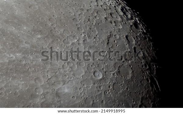 Crater Tycho and surrounding lunar surface\
photographed in color. Many terrain formations are visible, such as\
craters, highlands, lava-flooded areas of the lunar mare, and\
traces of blowout material\
