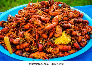 Crawfish Boil Colorful Seafood Outdoor Party Spicy Corn Cajun Craw Daddy's Amazing Tasty Spice Of Louisiana Texas Cajun Sea Food Lots Of Corn And Onion And Spice