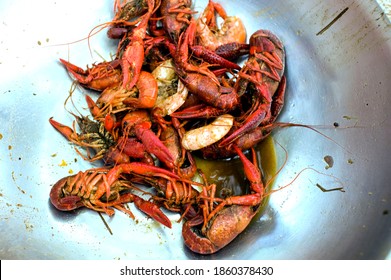 Crawfish Boils. Louisiana, New Orleans Crawfish Boil. Crawfish, Shrimp, Lobster, Seafood, Corn On The Cob, Sausage, Potatoes Boiled In Cajun Seasonings And Herbs. Classic Cajun Or Creole Cuisine.