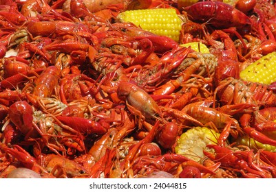 Crawfish And Corn Spreadout On A Table.