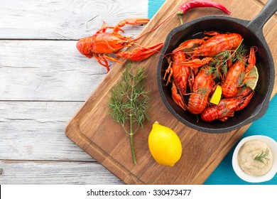 Crawfish On The Frying Pan On The Old Wooden White Table, Top View