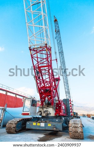 Crawler crane stands on the pavement in the port of Izmir Turkey.
