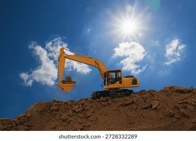 Crawler Excavators with are digging the soil in the construction site on the  sun and sky backgrounds