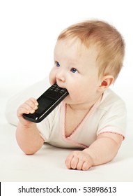 Crawling Baby With Mobile Phone On The Floor